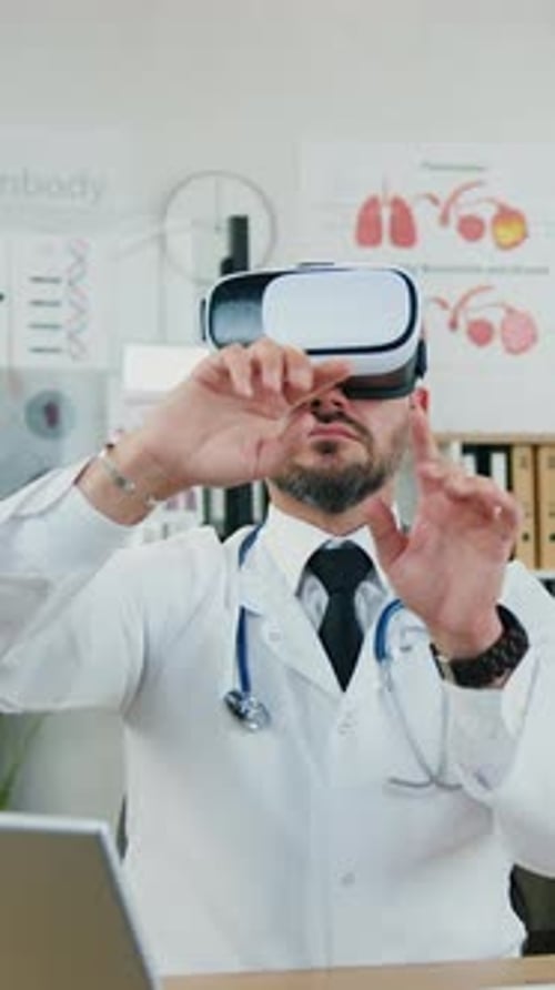 Front View of Likable Collected Medical Worker Which Working on Imaginary Display in Augmented