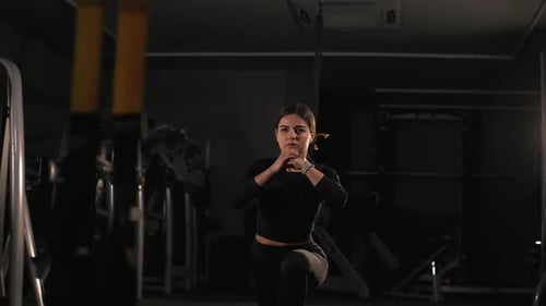 Fitness Woman Workout Exercise with Trx Equipment in the Gym