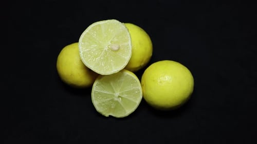 fresh Juicy Lemon Sliced Close-Up on Black Background studio shot on