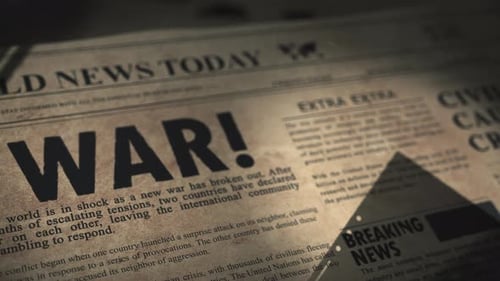 War article in old retro newspaper in archive of print news editorial office