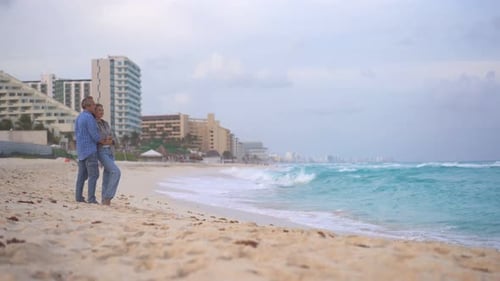 Romantic Middleaged Couple Enjoying a Peaceful Evening Together on the Beach Love Connection and