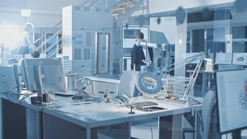 Electronics Design Engineer Takes His Place Starts Working with Circuit Boards, Doing Maintenance a