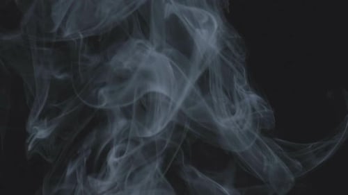 Wispy White Smoke on a Black Background
