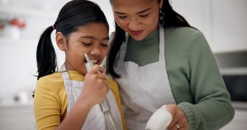 Mother and Child Bonding While Baking Together