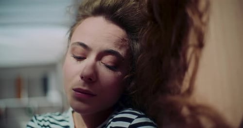 Close Up of Woman Hugging