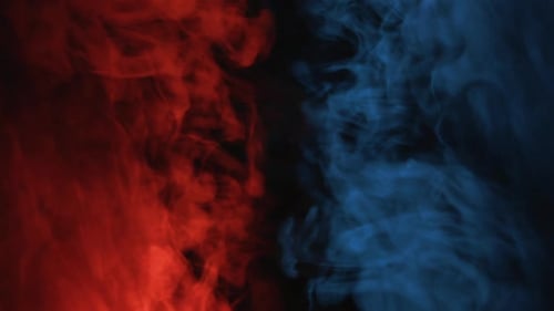 Red and Blue Smoke on Black Background