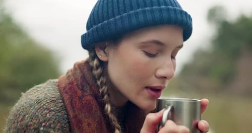 Camping, thinking and drinking coffee with woman relax and calm in nature by a lake