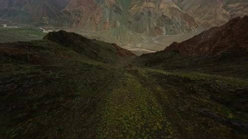 FPV Drone Descending a Mountain Slope in Tibet