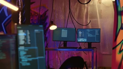 Computer Monitors Displaying Code in an Urban Setting