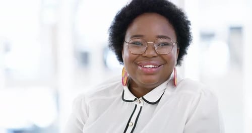 Smiling Woman with Glasses in Office Close Up