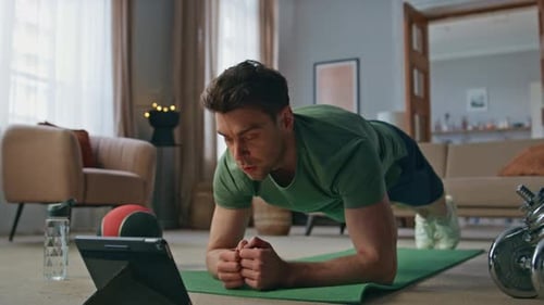 Adult Man Forearm Plank Exercise at Home