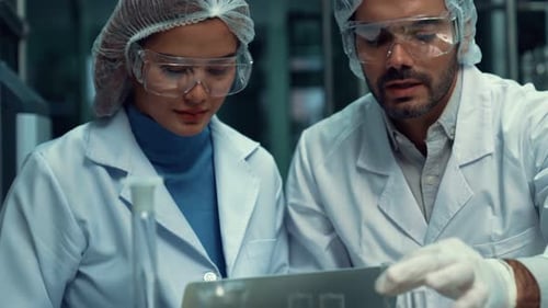 Researchers Examining Data in a Lab Setting