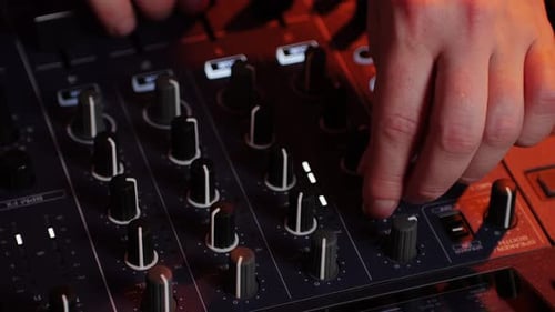 DJ Playing Music Scratch on Festival in Night Club Techno Musician with Headphones and Sunglasses