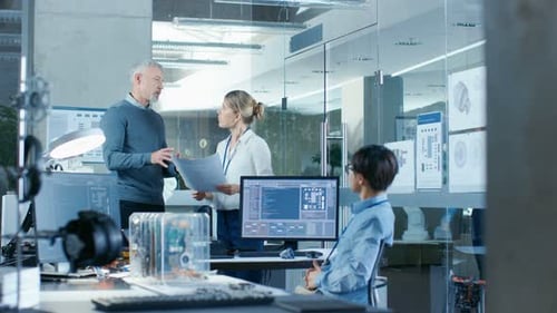 Engineers Discussing Project in Modern Research Office