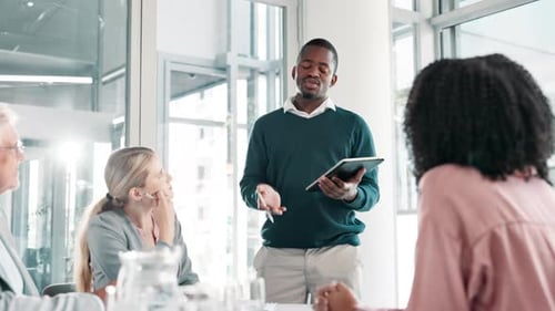 Business Meeting With Presentation in Modern Office
