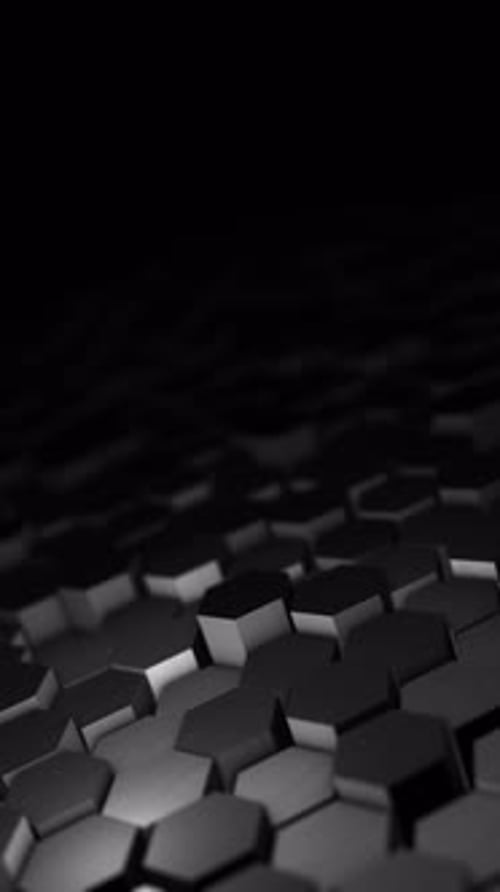 Vertical dark 3D hexagon surface in 4K 60fps loop, black modular depth