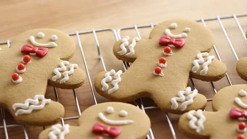 Closeup of Homemade Gingerbread Cookies on Cooling Racks Baking
