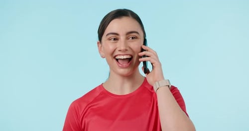 Happy, phone call and woman in studio networking, contact and laughing against blue background