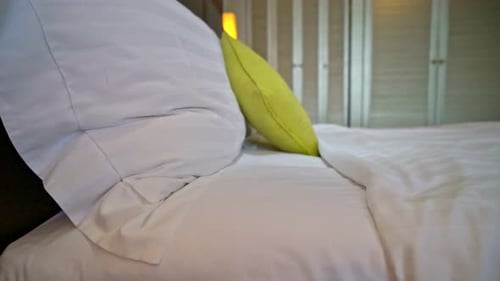 comfortable pillow decoration on bed in hotel bedroom