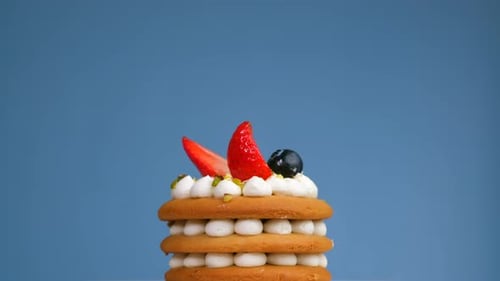 Delectable Layered Cake with Fresh Berries and Pistachios