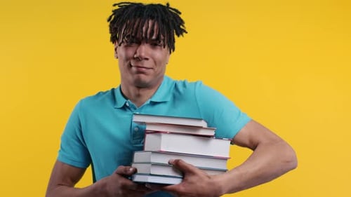 Lazy African Student is Dissatisfied with Amount of Books Homework on Yellow