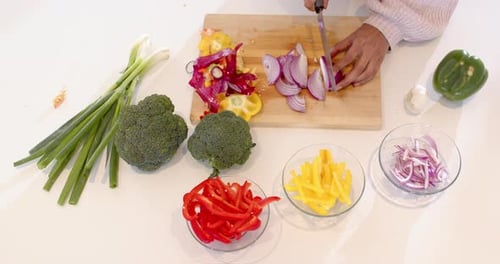 Vegetable Prep: Overhead View of Slicing Red Onion