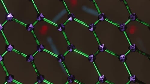 Close up of hexagon grid with green light. Looped animation