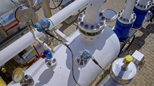 Industrial Pipelines and Machinery Viewed From Above