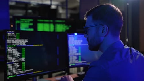 Programmer Working in Office at Night