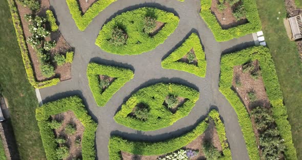 Top down rotating view of symmetrical green park and paths, Nature ...