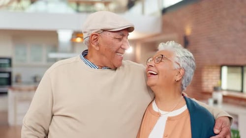 Senior Couple Embracing in a Bright Home