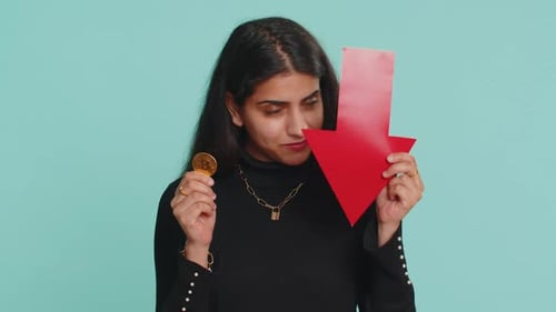 Upset Woman Showing Red Arrow Pointing Down Fall of Cryptocurrency Stock Market Mining Bitcoins BTC