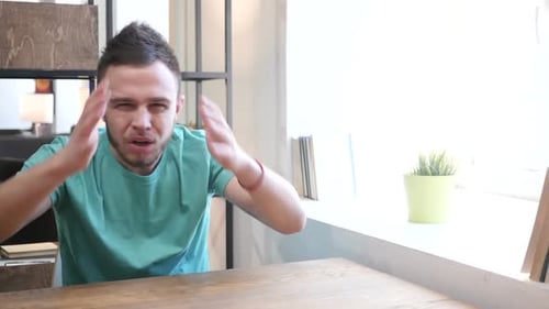 Gesture of Failure Upset Young Man