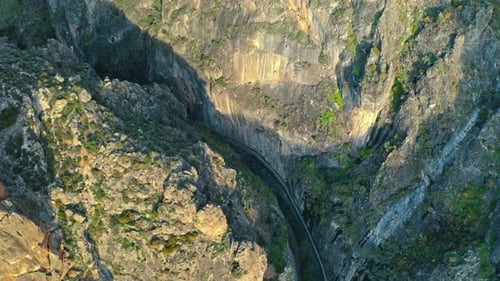 Deep Ancient Natural Geological Canyon of Sierra Nevada Carved By Waterfall Between Rocky Walls