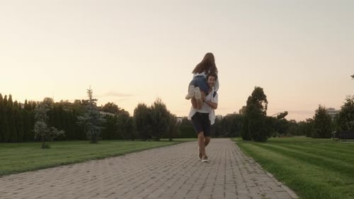 Couple Having Fun In The Park