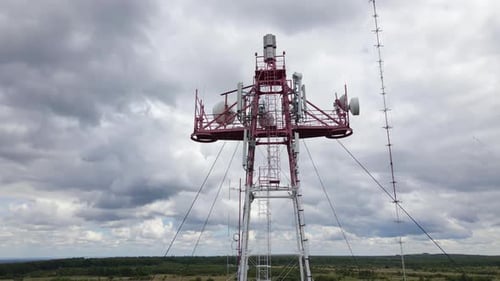 Aerial View of Telecommunications Cell Phone Tower with Wireless Communication Antennas for Network