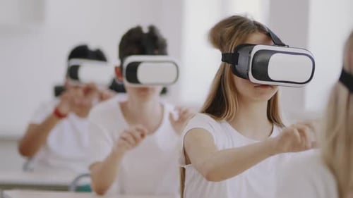 Children Use VR Headsets in Classroom