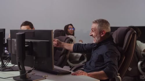 Office Worker Celebrates Success with Colleagues