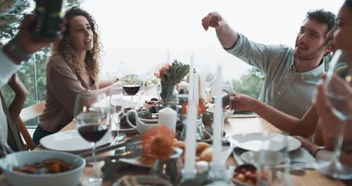 Friends Gathering at an Outdoor Table with Food