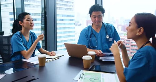 Doctor, team and meeting with discussion in office for healthcare planning and medical development