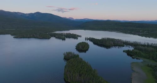 Orbiting Drone shot of Shadow Mountain Lake at sunset in Colorado
