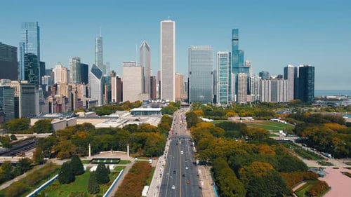 Cityscape of Downtown Skyline with Green Urban Park An Aerial View of a Cityscape Featuring a Dense