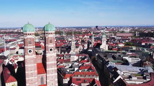 Aerial drone shot flying above the beautiful city of Munich, Germany.