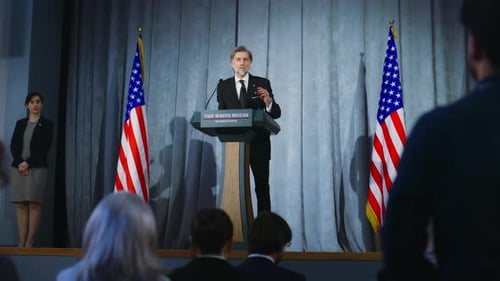 Man Giving Political Speech at Press Conference