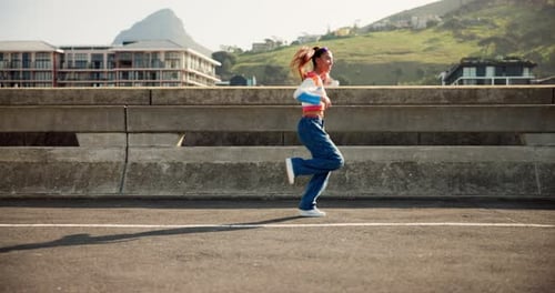Dance, energy and youth with woman in city for freedom, inspiration and creative talent