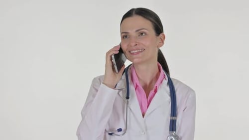 Woman Doctor Using Smartphone and Talking