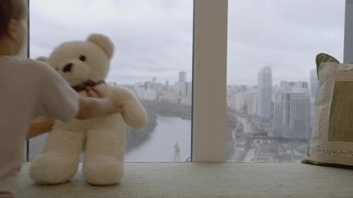 Girl Put Teddy Bear to Window Creative Girl Put Bear on Windowsill with View of City Beautiful Teddy
