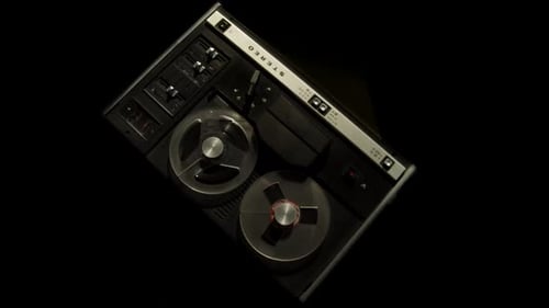 Vintage Reel-to-Reel Tape Recorder on Black