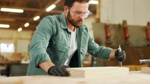 Carpentry, woodwork and man with dust in factory for furniture, manufacturing or lumber production