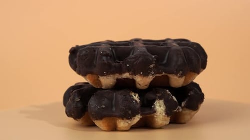 Chocolate Covered Waffles Stacked on Table